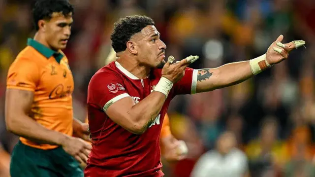 Sione Tuipulotu celebrates