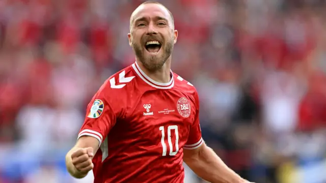 Christian Eriksen celebrates a goal for Denmark