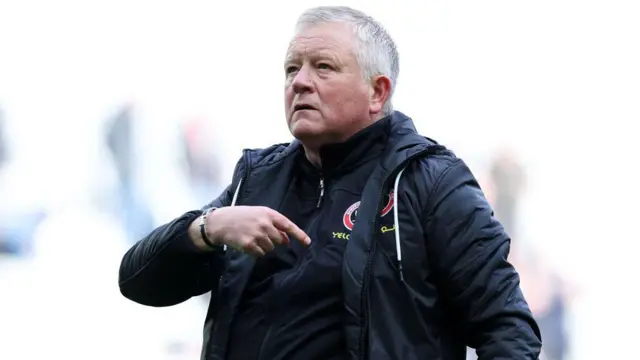 Chris Wilder, Manager of Sheffield United, acknowledges the fans