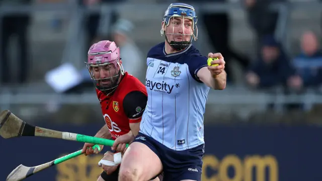 John Hetherton is tackled by Ruairi McCrickard