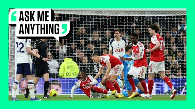 Eberechi Eze of Arsenal celebrates on green 'Ask Me Anything' border