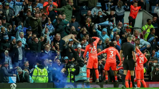 Coventry City players and fans celebrate Bobby Thomas scoring at Ewood Park