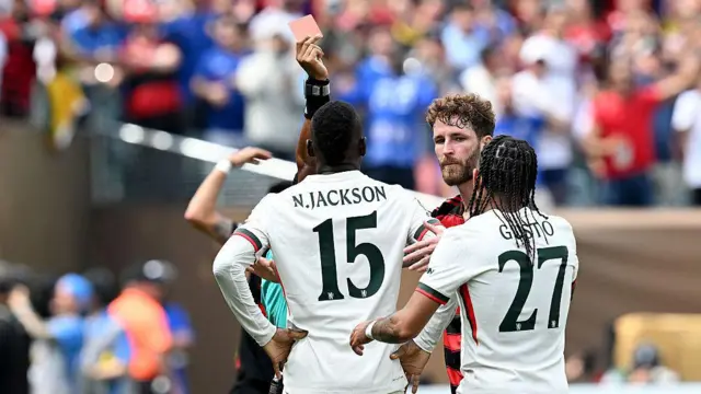 Nicolas Jackson is shown a red card