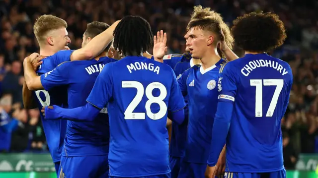 Leicester City players celebrate James Jordan's goal against Wrexham