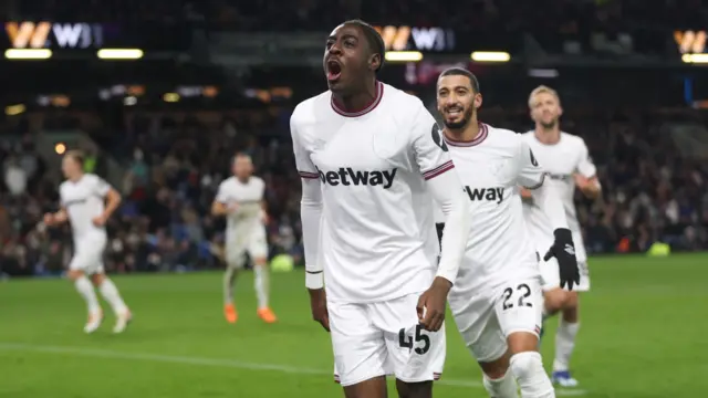 West Ham United's Divin Mubama celebrates scoring his side's first goal during the Premier League match between Burnley FC and West Ham United at Turf Moor