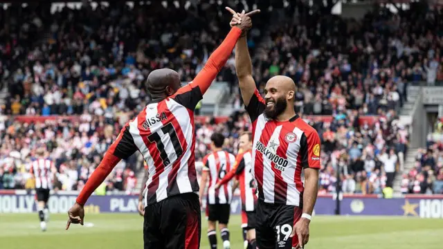 Yoane Wissa celebrates scoring with teammate Bryan Mbeumo