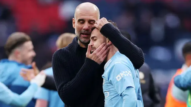 Pep Guardiola hugging Bernardo Silva