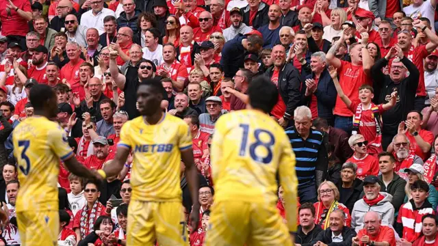 Crystal Palace players celebrate at Liverpool