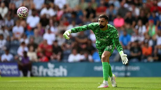 Giorgi Mamardashvili throws out the ball at Deepdale against Preston