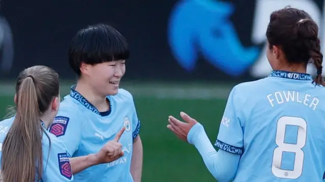 Aoba Fujino celebrates scoring for Manchester City