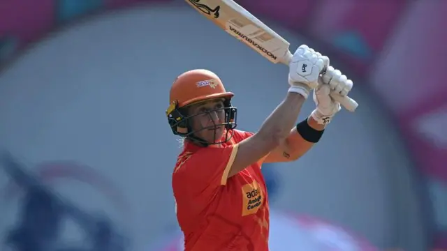 Gujarat Giants' Sophie Devine plays a shot during the Women's Premier League (WPL) Twenty20 cricket match between Gujarat Giants and UP Warriorz 