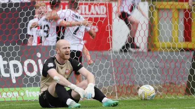 Portadown goalkeeper Aaron McCarey shows his disappointment after Niall McGinn's last-gasp deflected winner for Glentoran at Shamrock Park