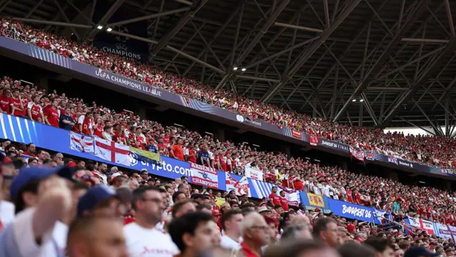 Arsenal fans watch the action