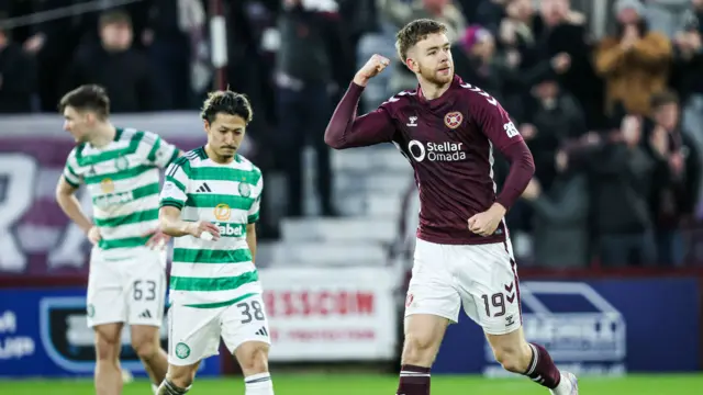 Stuart Findlay celebrates after scoring for Hearts against Celtic