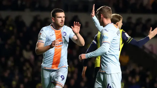 Zan Vipotnik celebrates his goal at Oxford with Jay Fulton 