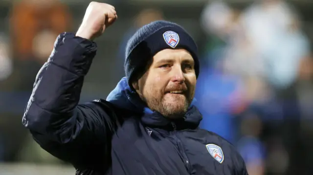 Ruaidhri Higgins salutes the Coleraine fans after Friday's win
