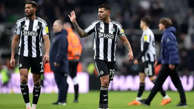 Joelinton and Bruno Guimares at full-time