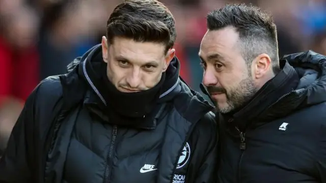 Adam Lallana speaks to ex-Brighton manager Roberto de Zerbi