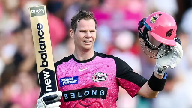 Sydney Sixers' Steve Smith celebrates his century