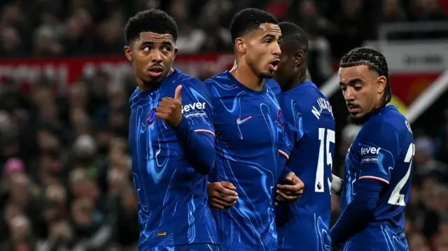 Chelsea players line up to defend a free-kick