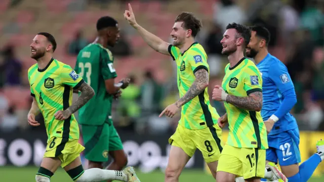 Martin Boyle (left) leads Australia celebrations with Connor Metcalfe and Aiden O’Neill 