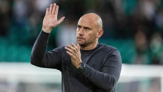 Hibernian head coach David Gray acknowledges supporters at full-time