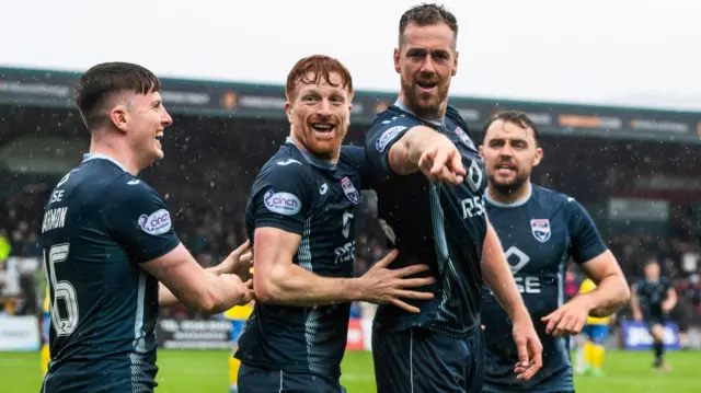 Ross County's George Harmon, Simon Murray and Jordan White celebrate