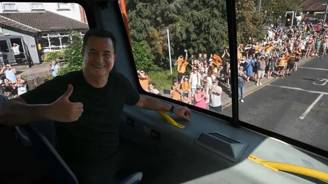Acun Ilicali in front of Hull City Hall after touring the city on open-top bus