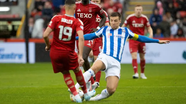 Aberdeen's Ester Sokler is tackled by Kilmarnock's Brad Lyons