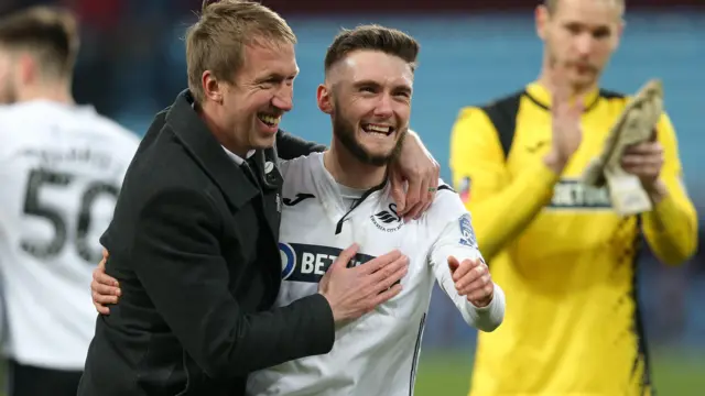 Matt Grimes celebrates with Graham Potter in 2019