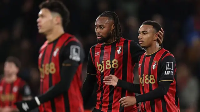 Antoine Semenyo and Eli Junior Kroupi of Bournemouth embrace each other 