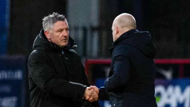 Steven Naismith shakes hands with Tony Docherty