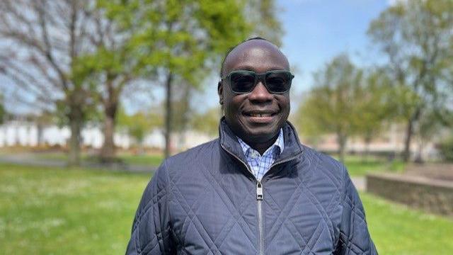 Dr Moses Duku in park 