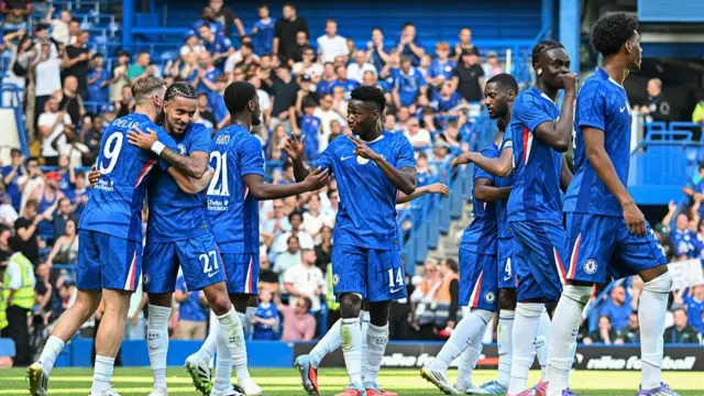 Chelsea players celebrate a goal