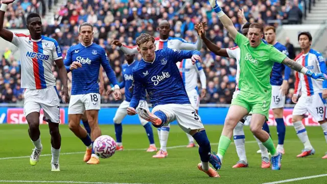 James Garner defending for Everton v Crystal Palace