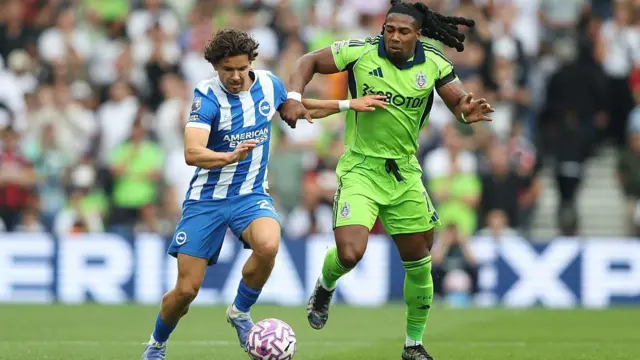Ferdi Kadioglu in action against Fulham