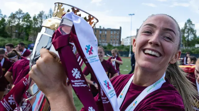 Hearts captain Georgia Hunter with the SWPL trophy