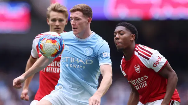 Elliot Anderson playing for Manchester City