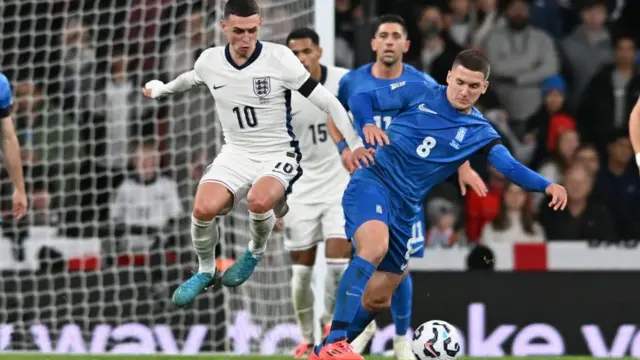 Phil Foden (10 England) challenges Christos Tzolis (8 Greece) during the UEFA Nations League League B, Group 2 match between England and Greece at Wembley Stadium