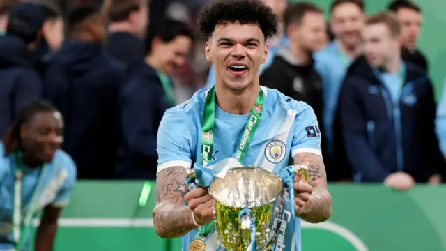 Nico O'Reilly holds the Carabao Cup