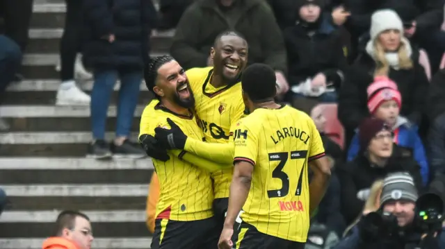 Imran Louza (left) is congratulated by two Watford tema-mates after his goal at Sunderland   