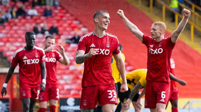 Aberdeen celebrate a goal in their 6-0 win over Dumbarton in the League Cup