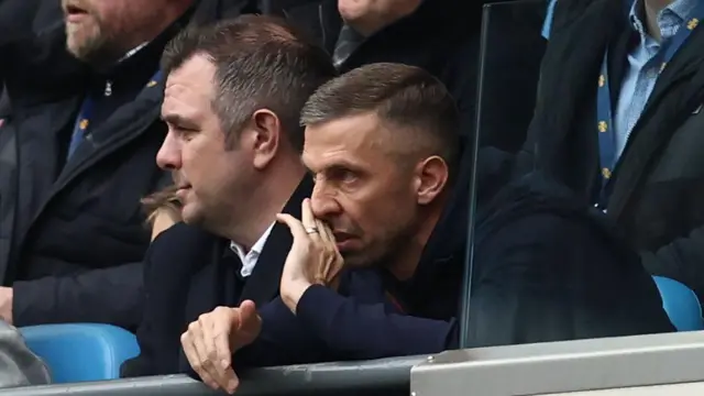 Gary O'Neil watches from his seat in the stands