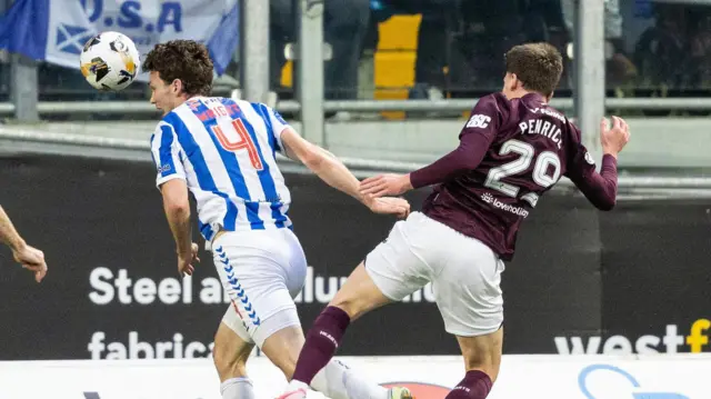 Hearts' James Penrice fouls Kilmarnock's Joe Wright and gives away a penalty during a William Hill Premiership match between Kilmanock and Heart of Midlothian 