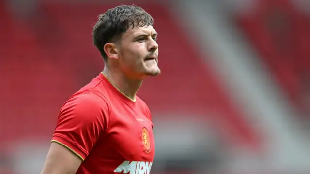 Will Lankshear playing in a pre-season friendly wearing his red Middlesbrough kit