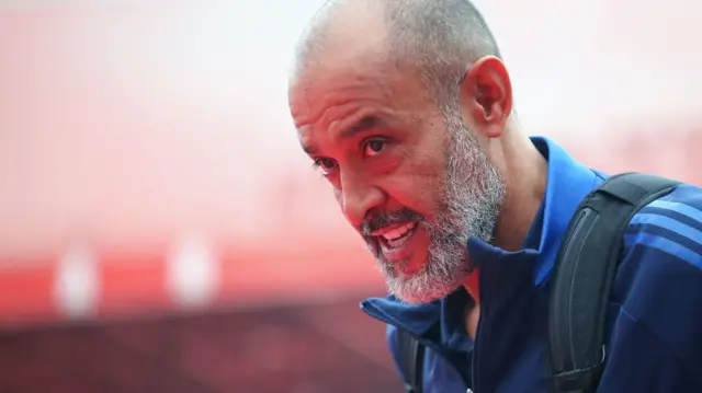 Nuno Espirito Santo enters a football stadium