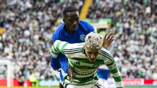 Rangers' Mohamed Diomande and Celtic's Luke McCowan