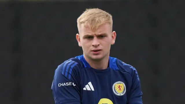 Rory Mahady wearing a Scotland goalkeeper's training top
