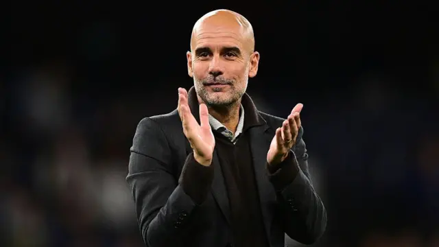 Pep Guardiola applauds the Man City fans