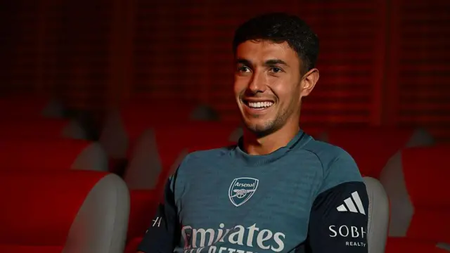 Martin Zubimendi wearing a little blue Arsenal training t-shirt